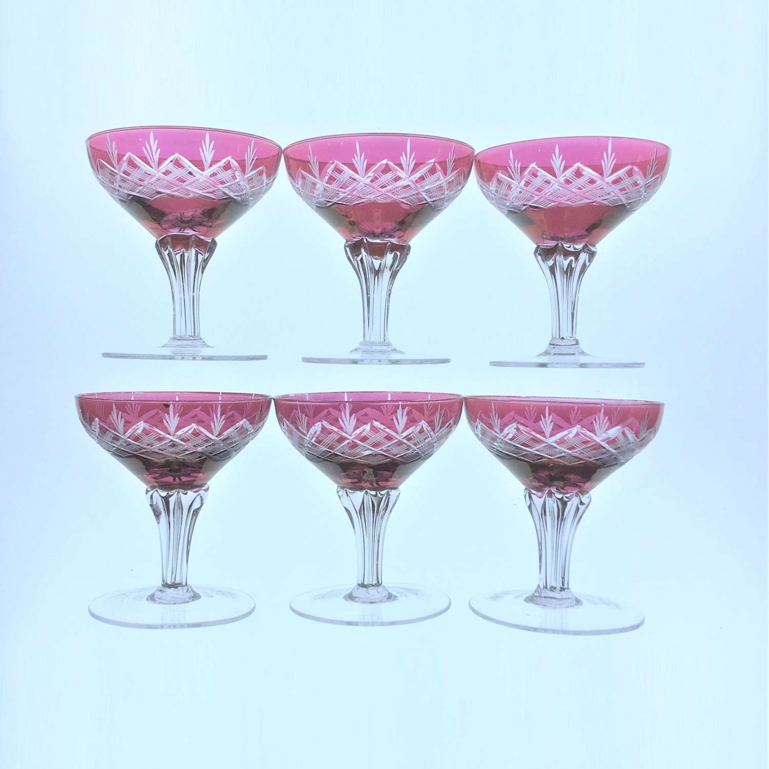 Set of six (6) Cranberry Glass Cut to Clear Crystal Champagne Coupes