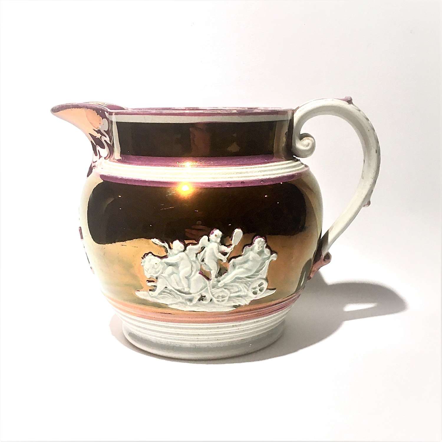 Regency era, pink copper lustre ware jug with neoclassical motifs