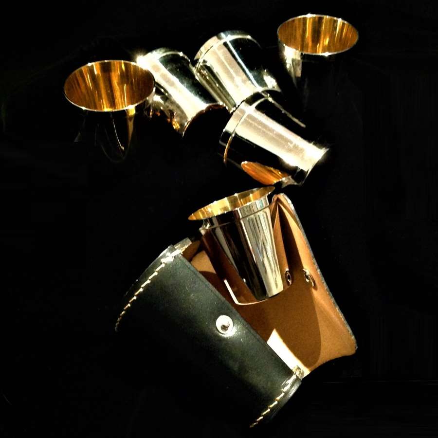 Set of six (6) silver plated & gilt lined stirrup cups in leather case