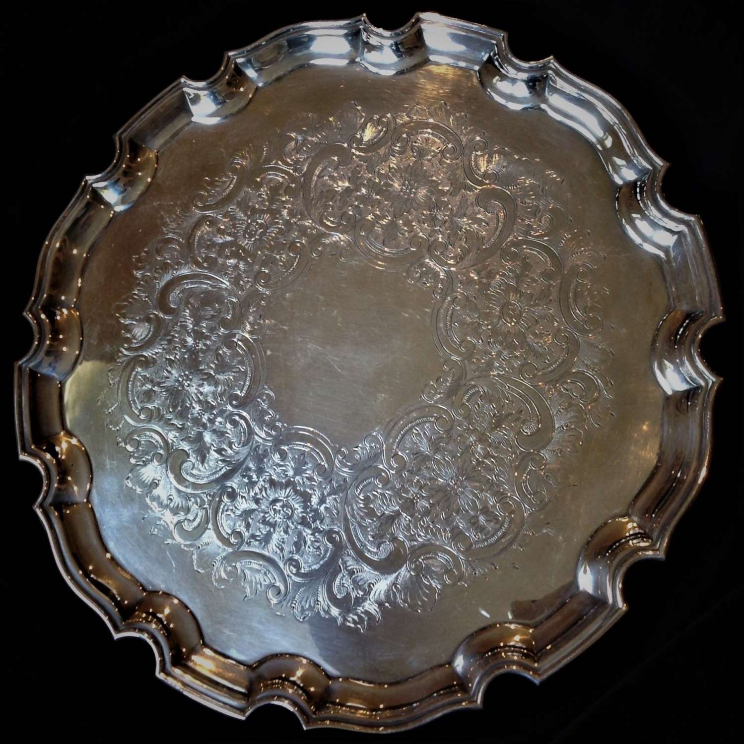 Circular, silver plated scalloped edge serving tray