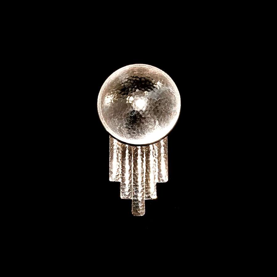 An Art Deco "Comet" silver brooch or patented perfume dress clip