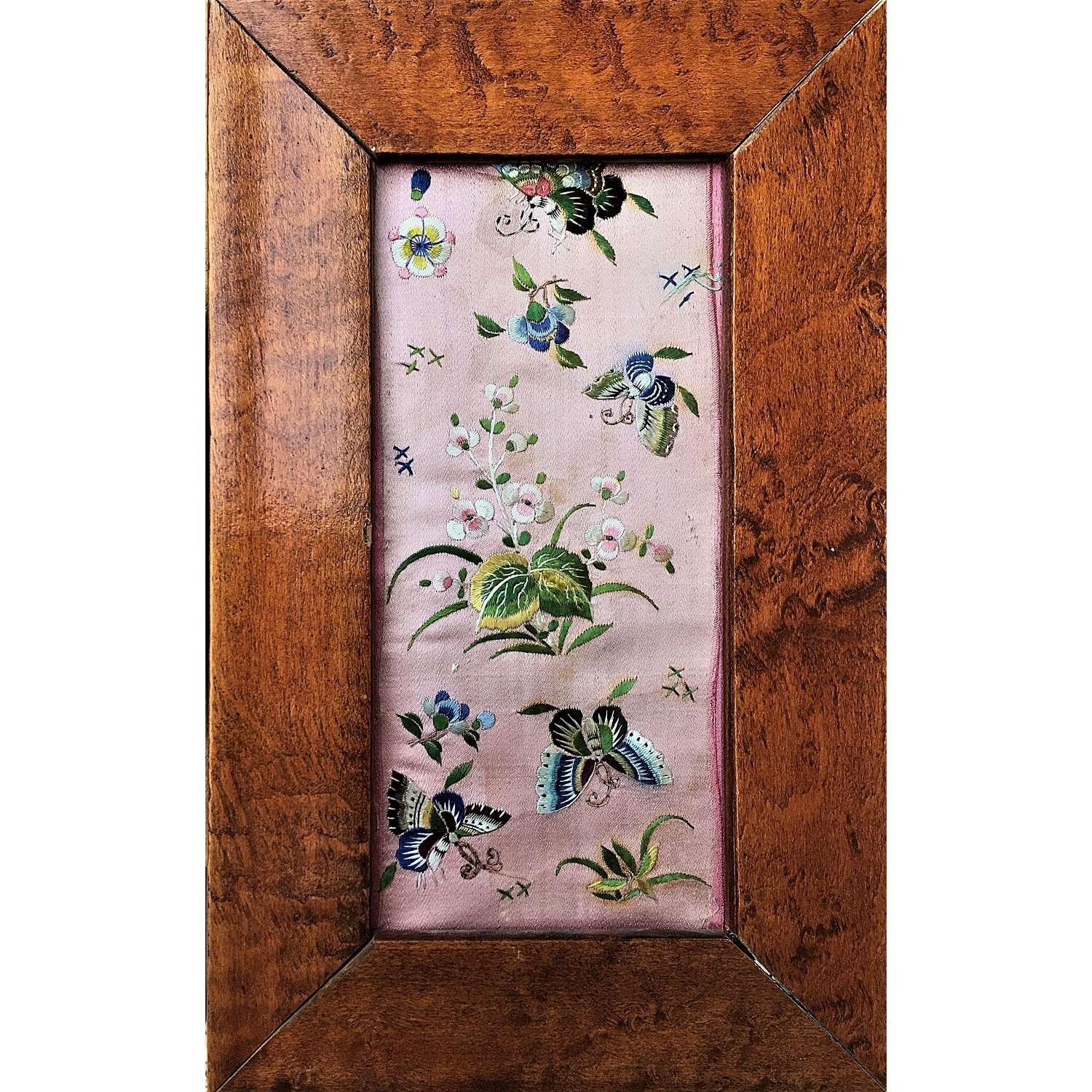 Framed section of pink silk embroidered with butterflies & flowers