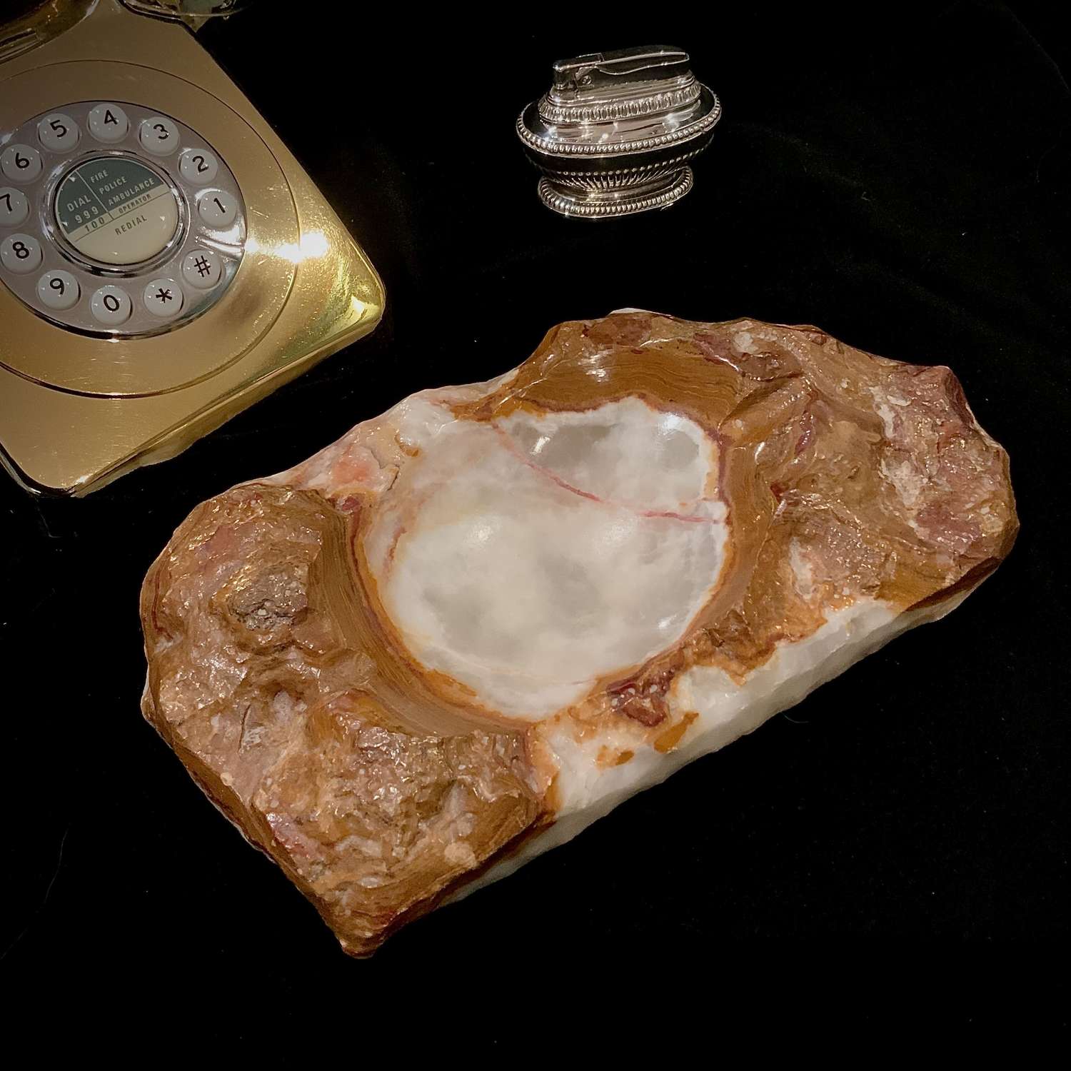 A very large natural brown and green onyx marble cigar ashtray