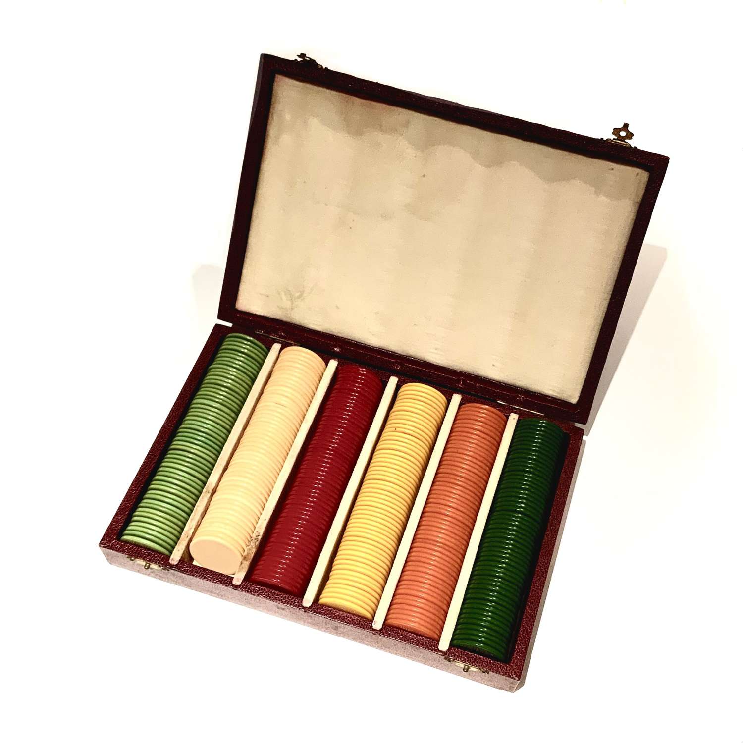 A Vintage Boxed Set of Coloured Poker Chips or Gaming Counters