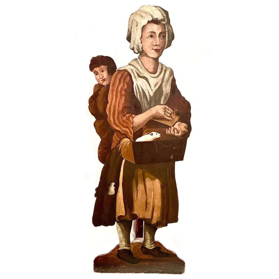 A Late 18th Century Dummy Board of a Guinea Pig Seller & Child